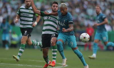 Sporting Lisbon's Manuel Ugarte fights for the ball with Tottenham Hotspur's Richarlison.