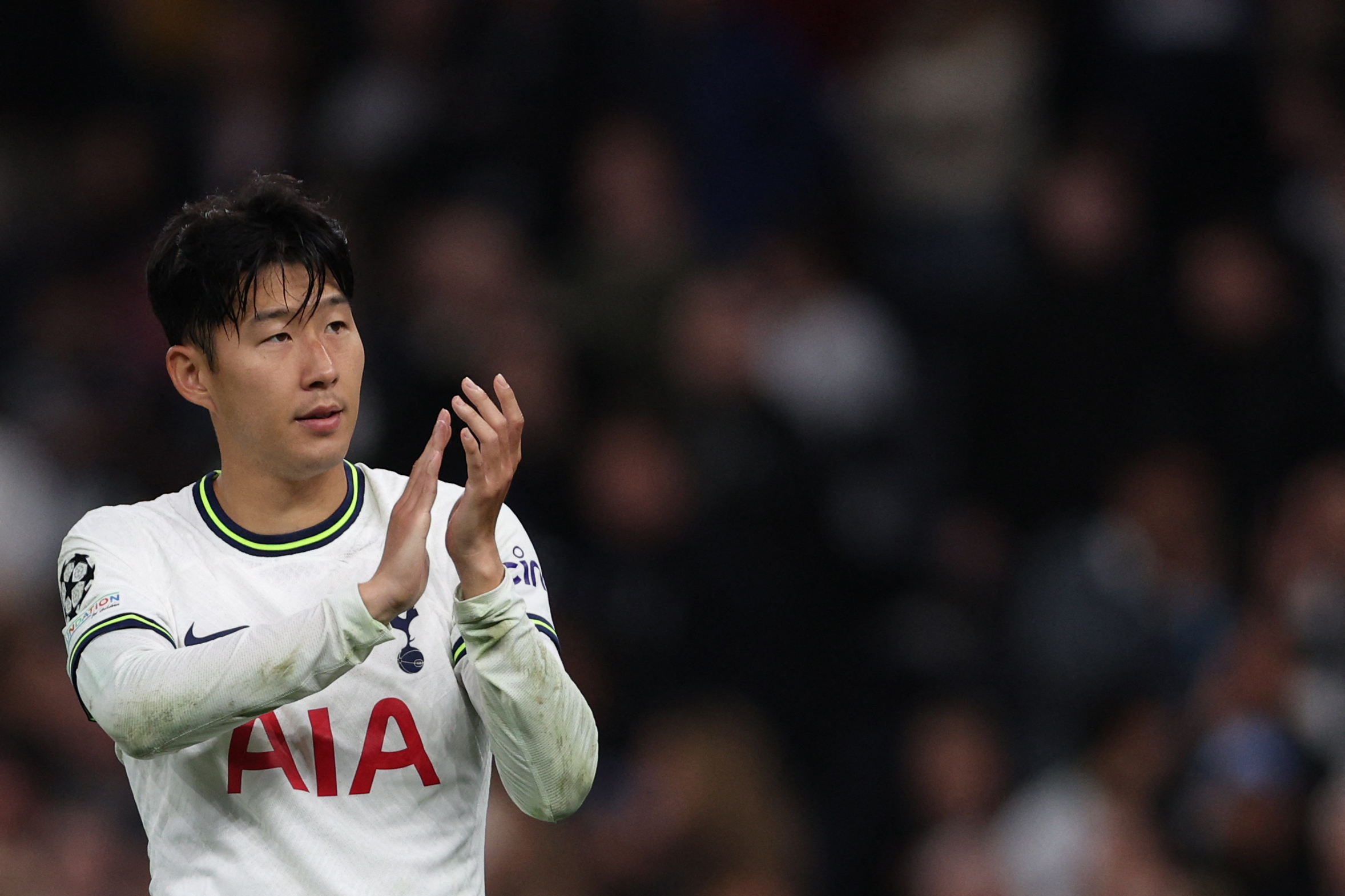 Tottenham Hotspur's Son Heung-Min applauds the fans.