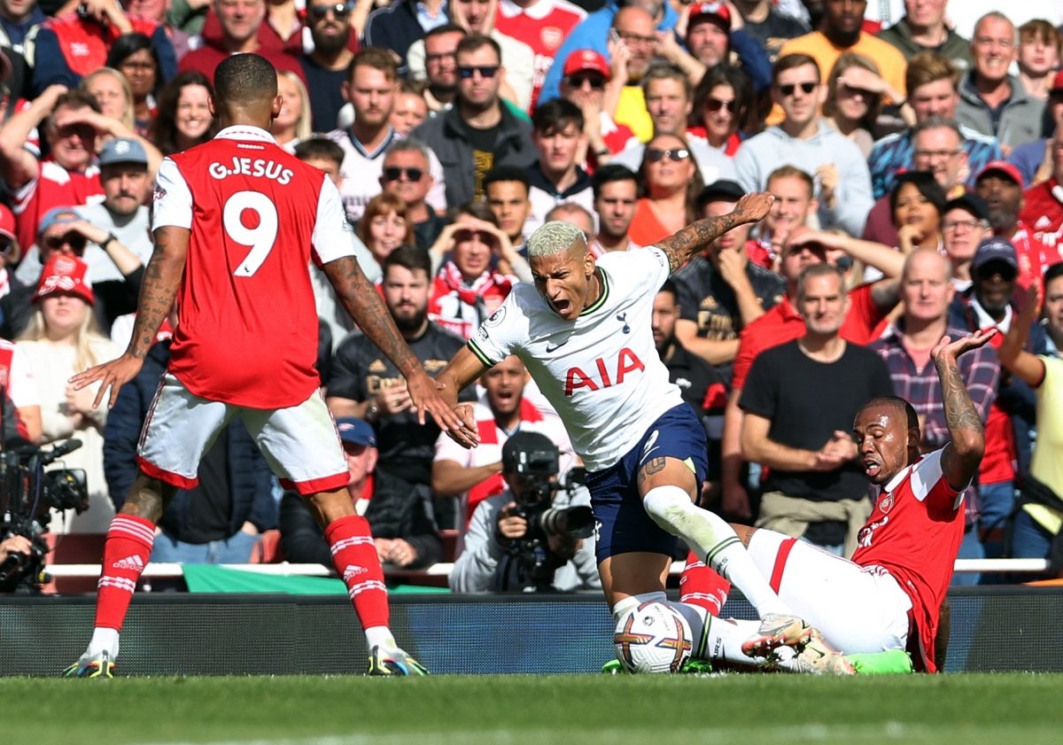 Gabriel Jesus wins a penalty after being fouled by Gabriel Magalhaes as Gabriel Jesus looks on during the derby in October 2022. (Photo by ADRIAN DENNIS/AFP via Getty Images)