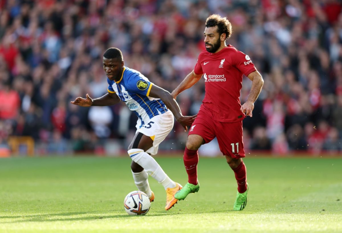 Moises Caicedo of Brighton and Hove Albion with Mohamed Salah of Liverpool during a Premier League match that ended 3-3 at Anfield in October 2022.