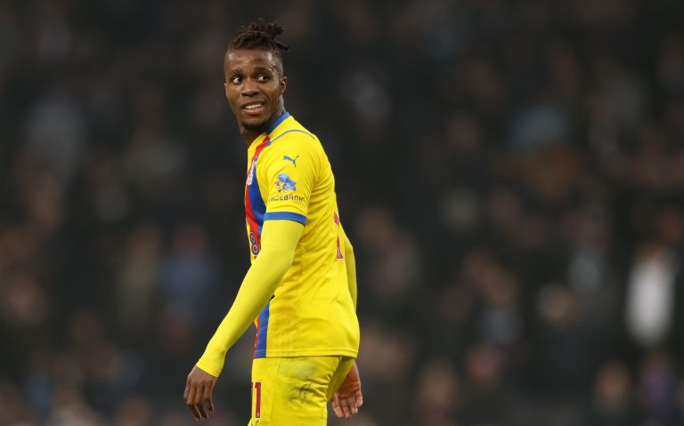 Wilfried Zaha of Crystal Palace looks on during a Premier League match against Tottenham Hotspur.