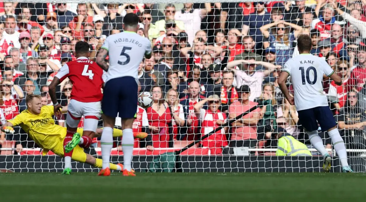 Harry Kane of Tottenham Hotspur scores a penalty past Arsenal goalkeeper, Aaron Ramsdale. 