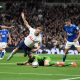 Harry Kane wins the penalty for Tottenham Hotspur after a tackle from Everton's Jordan Pickford. (Photo by DANIEL LEAL/AFP via Getty Images)