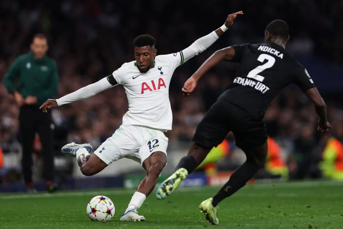 Tottenham Hotspur's Emerson Royal fights for the ball with Frankfurt's Evan N'Dicka.