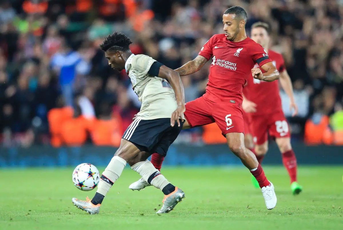 Ajax's Mohammed Kudus battles for the ball with Liverpool's Thiago Alcantara. 