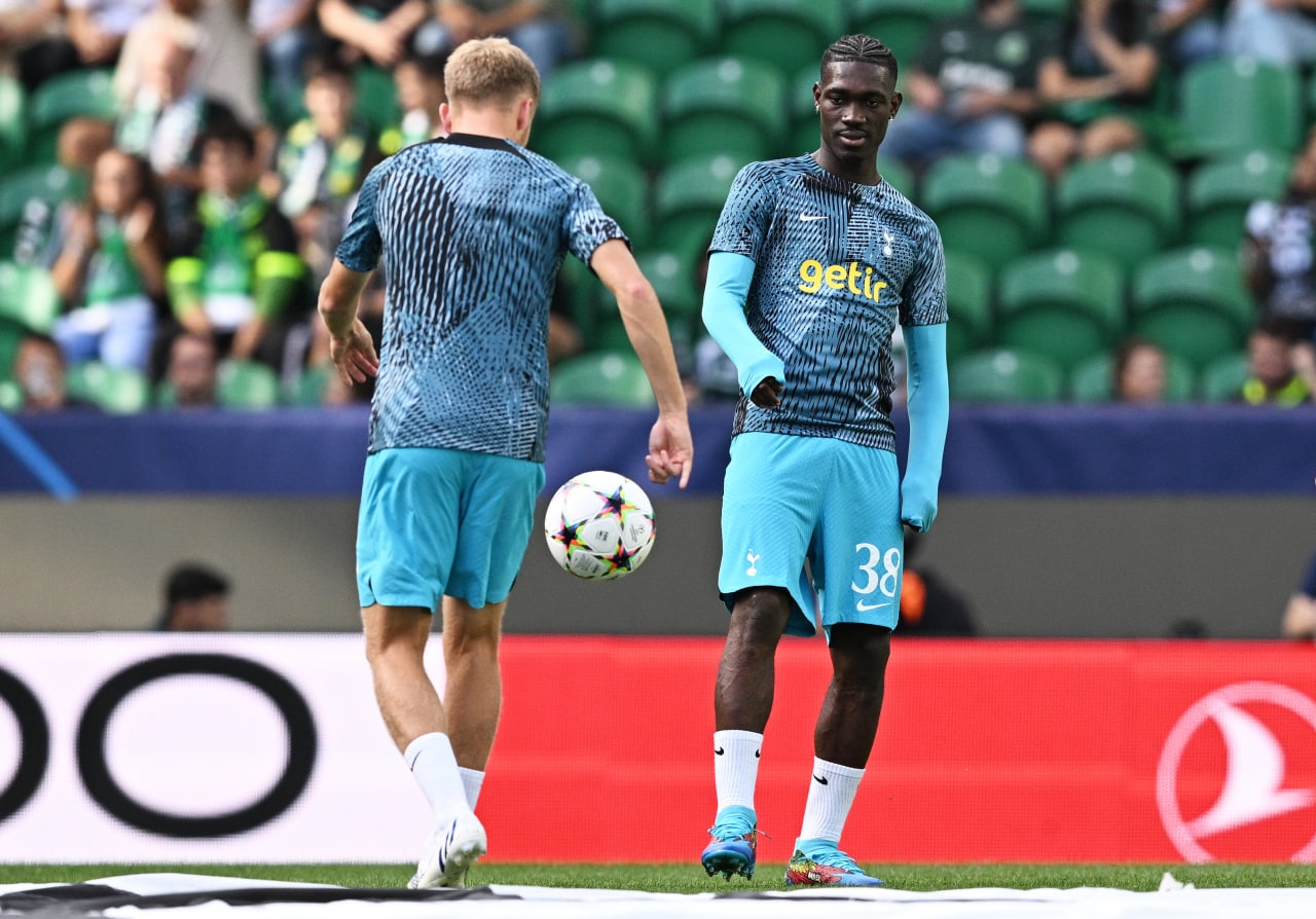 Yves Bissouma warming up for Tottenham before the Champions League clash against Sporting CP. (Photo by Octavio Passos/Getty Images)