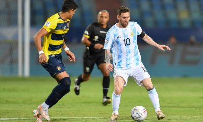 Ecuador's Piero Hincapie tries to mark Argentina's Lionel Messi in a Copa America match. (