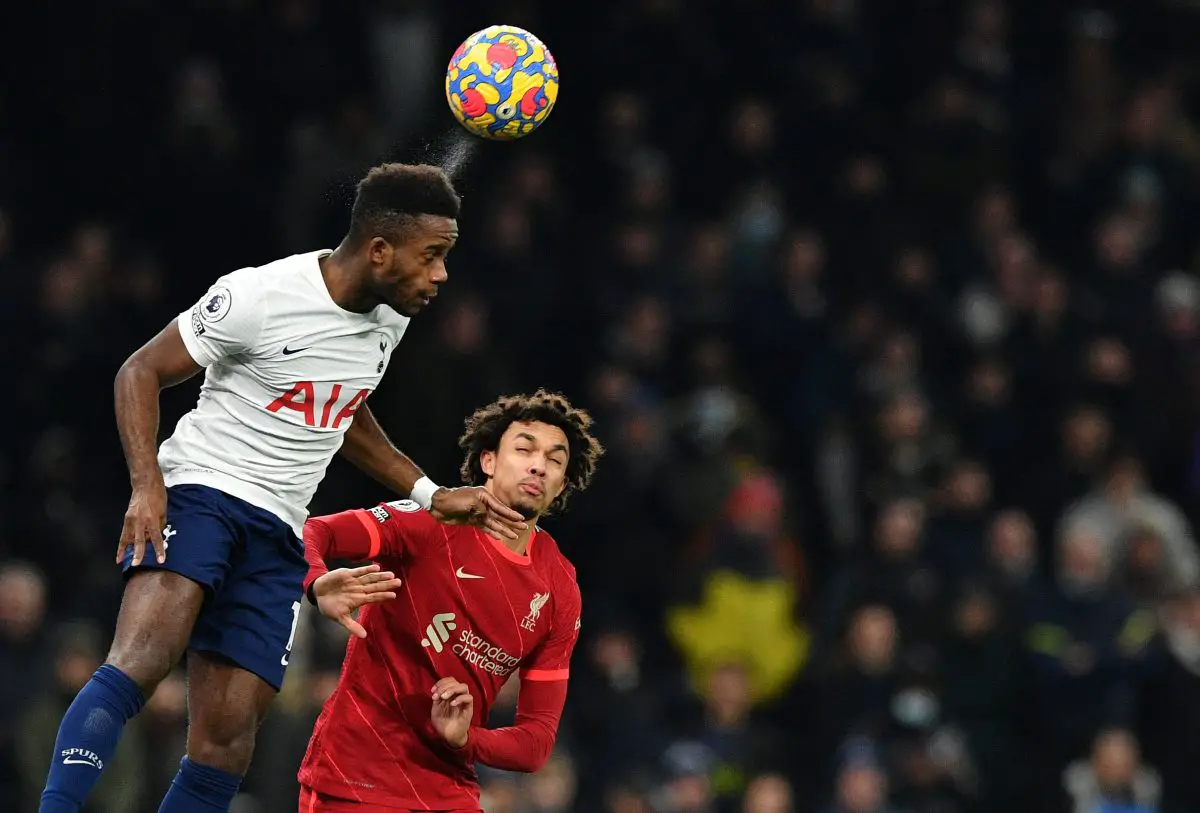 Tottenham Hotspur's Ryan Sessegnon heads the ball as Trent Alexander-Arnold of Liverpool watches on.