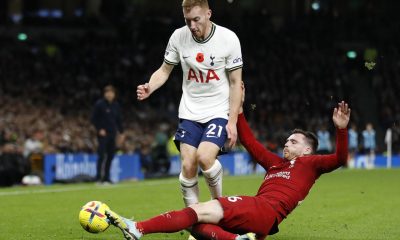 Tottenham Hotspur's Dejan Kulusevski is challenged by Andy Robertson of Liverpool