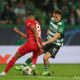 Frankfurt's Djibril Sow fights for the ball with Sporting Lisbon's Manuel Ugarte.