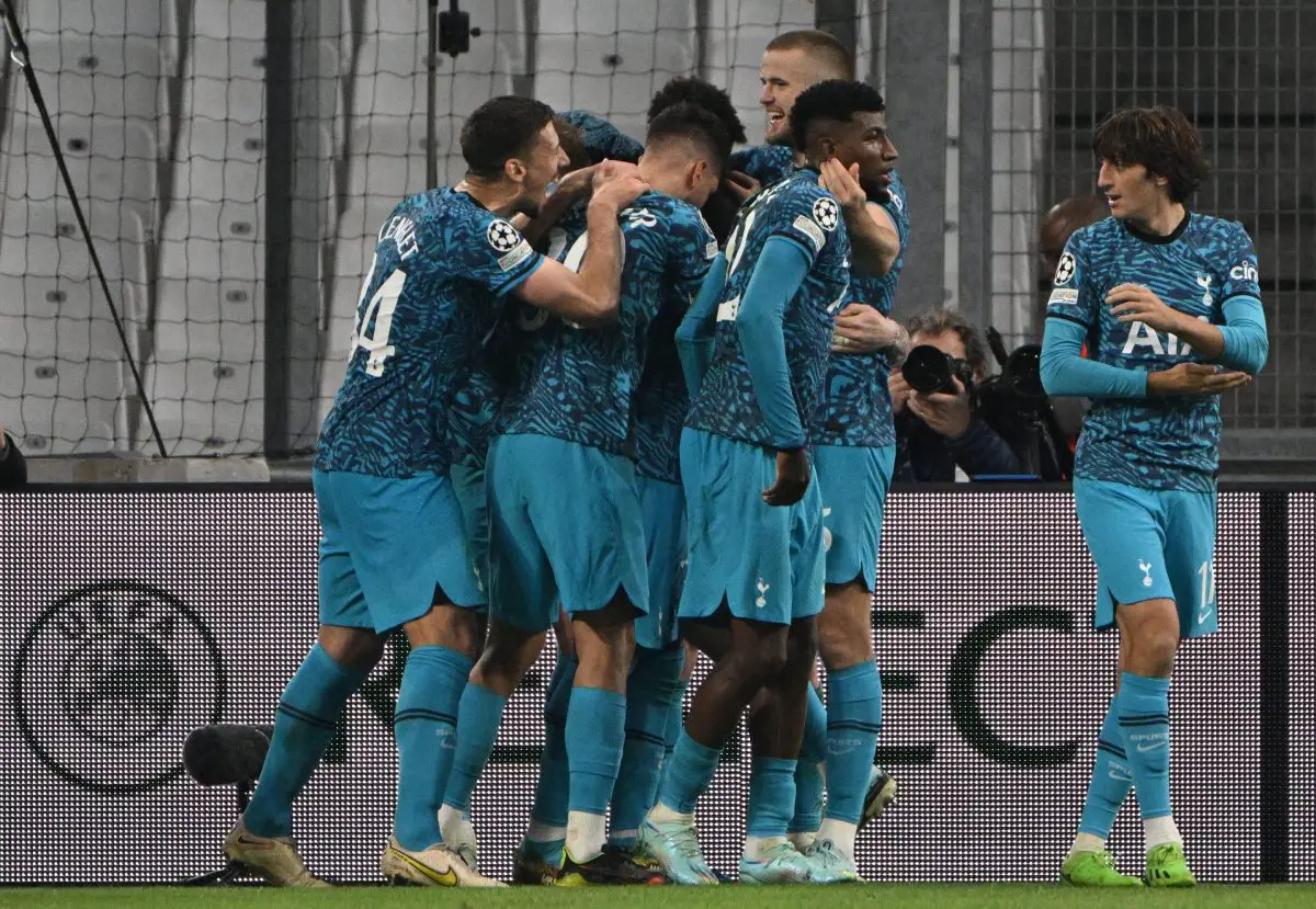 Tottenham Hotspur players celebrate scoring against Olympique de Marseille.