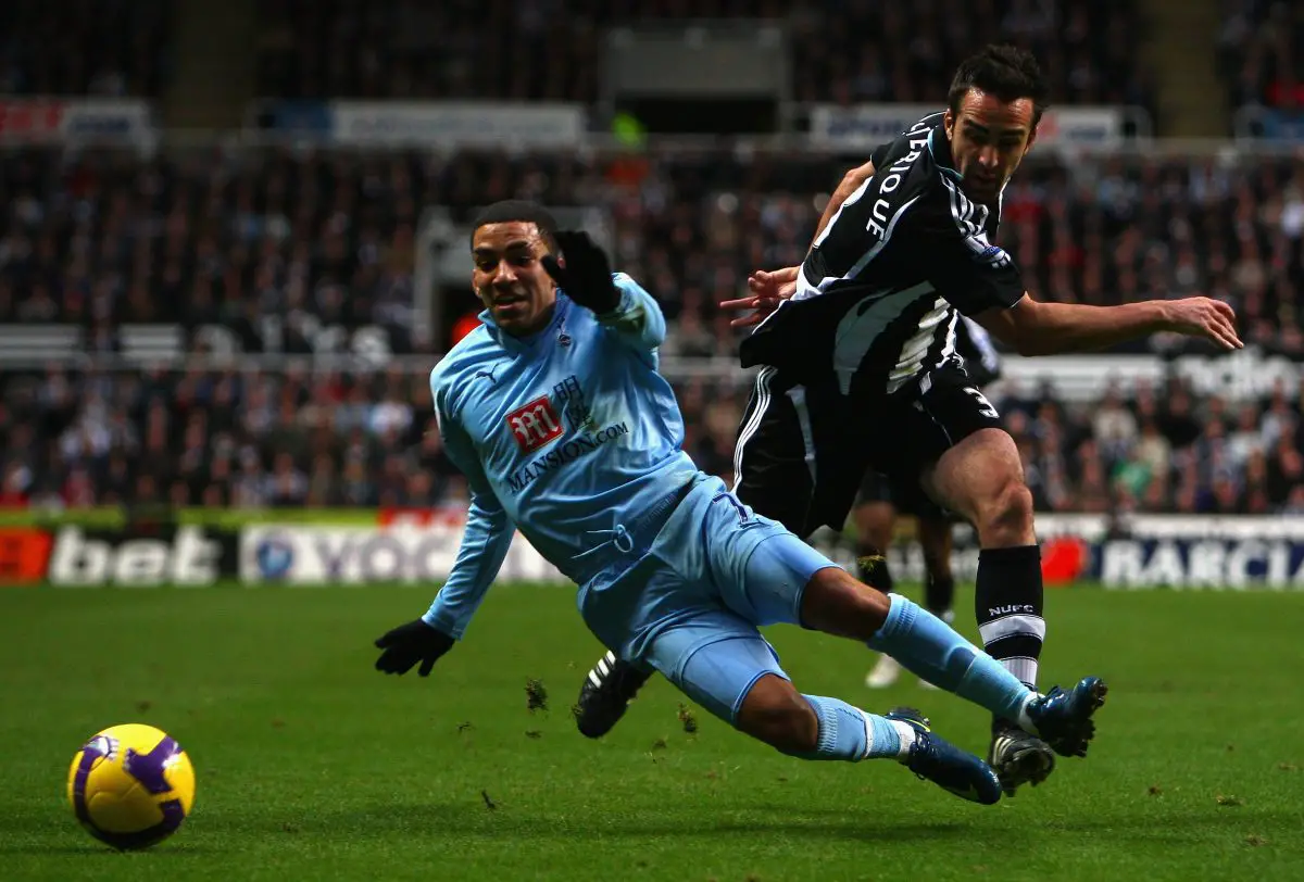Aaron Lennon of Tottenham Hotspur tangles with Jose Enrique of Newcastle United, (Photo by Richard Heathcote/Getty Images)