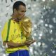 Cafu with the 2022 FIFA World Cup trophy. (Image by PEDRO UGARTE/AFP via Getty Images)