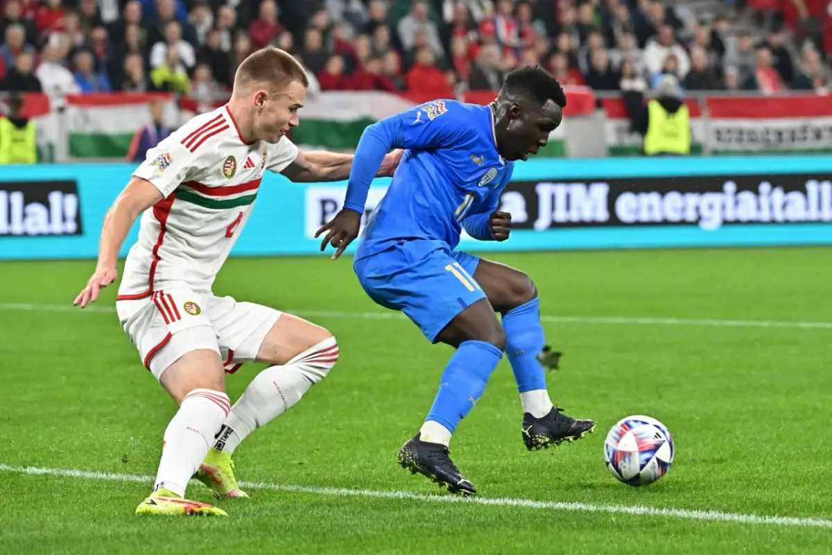 Hungary's defender Attila Szalai (L) and Italy's forward Degnand Wilfried Gnonto vie for the ball during the UEFA Nations League Group 3 football match between Hungary and Italy in Budapest on September 26, 2022. (Photo by Attila KISBENEDEK / AFP) (Photo by ATTILA KISBENEDEK/AFP via Getty Images)
