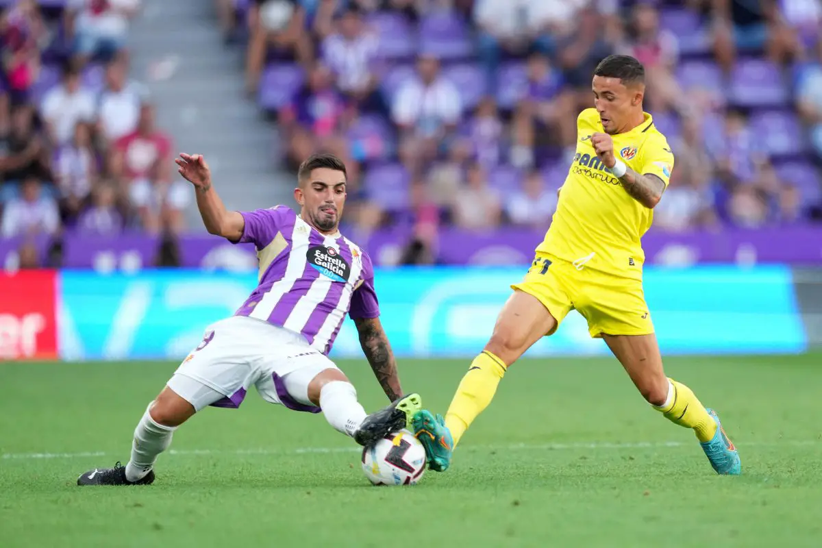 Monchu of Real Valladolid challenges Yeremi Pino of Villarreal CF. 