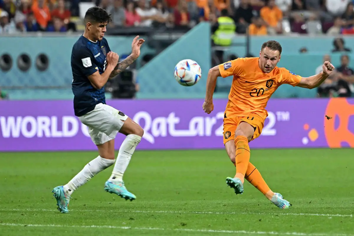 Netherlands' Teun Koopmeiners kicks the ball past Ecuador's Piero Hincapie during a Qatar 2022 World Cup match. (Photo by Alberto PIZZOLI / AFP) (Photo by ALBERTO PIZZOLI/AFP via Getty Images)