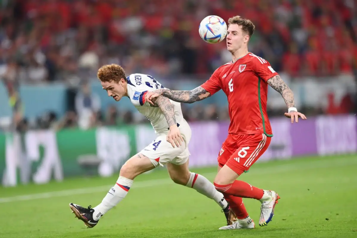 Joe Rodon in action for Wales against USMNT at the FIFA World Cup in Qatar.