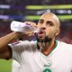 Sofyan Amrabat of Morocco has a drink prior to the FIFA World Cup Qatar 2022 Group F match between Canada and Morocco at Al Thumama Stadium on December 01, 2022 in Doha, Qatar. (Photo by Catherine Ivill/Getty Images)