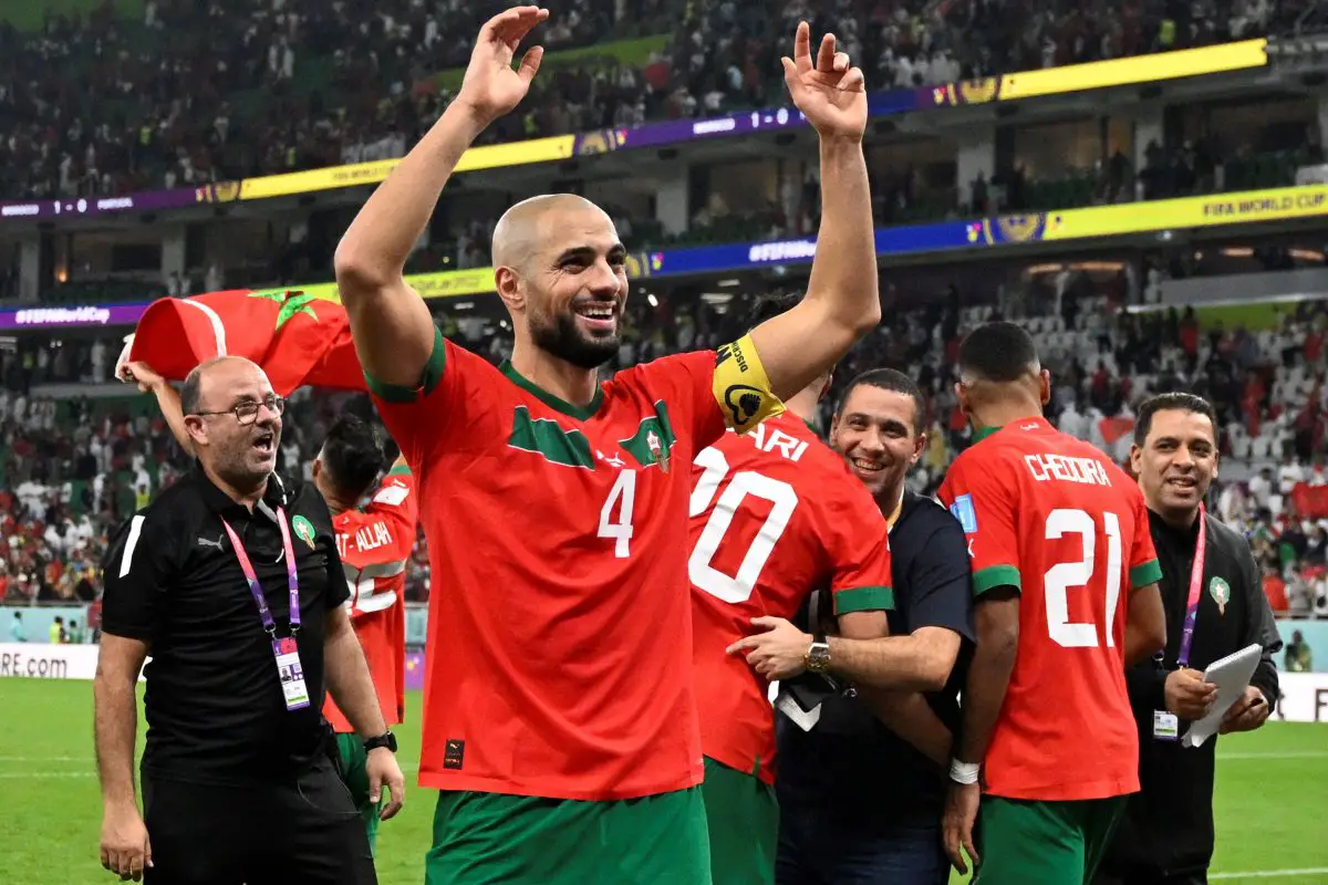 Morocco's midfielder Sofyan Amrabat celebrates after winning against Portugal. 