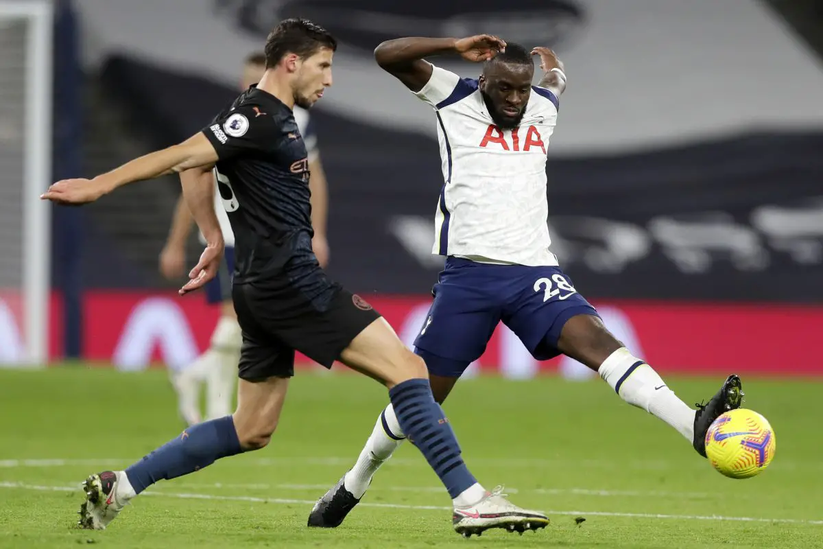 Manchester City's Portuguese defender Ruben Dias vies for possession with Tottenham Hotspur's Tanguy Ndombele. 
