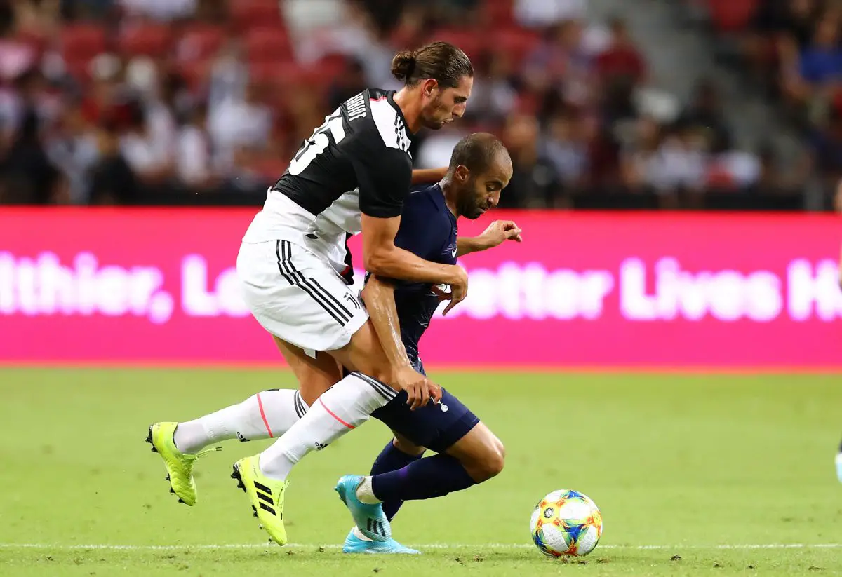 Lucas Moura of Tottenham Hotspur and Adrien Rabiot of Juventus. 
