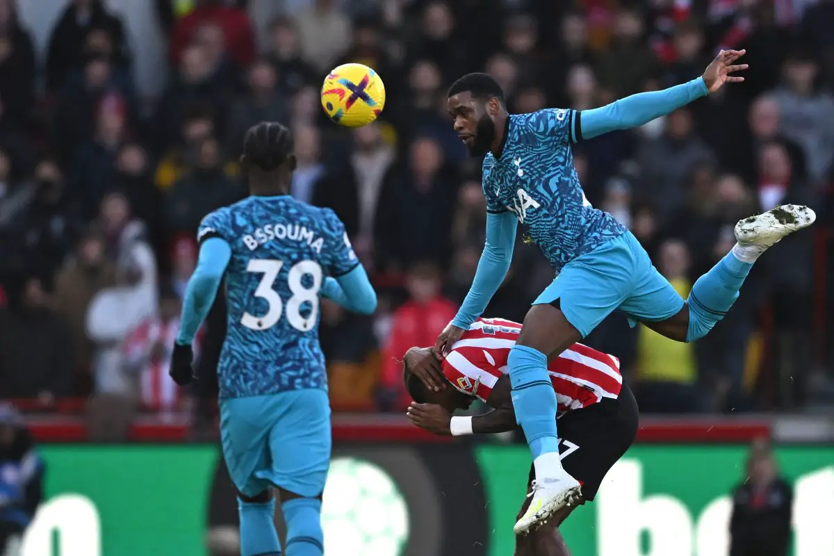 Tottenham Hotspur's Japhet Tanganga battles aerially with Ivan Toney of Brentford.