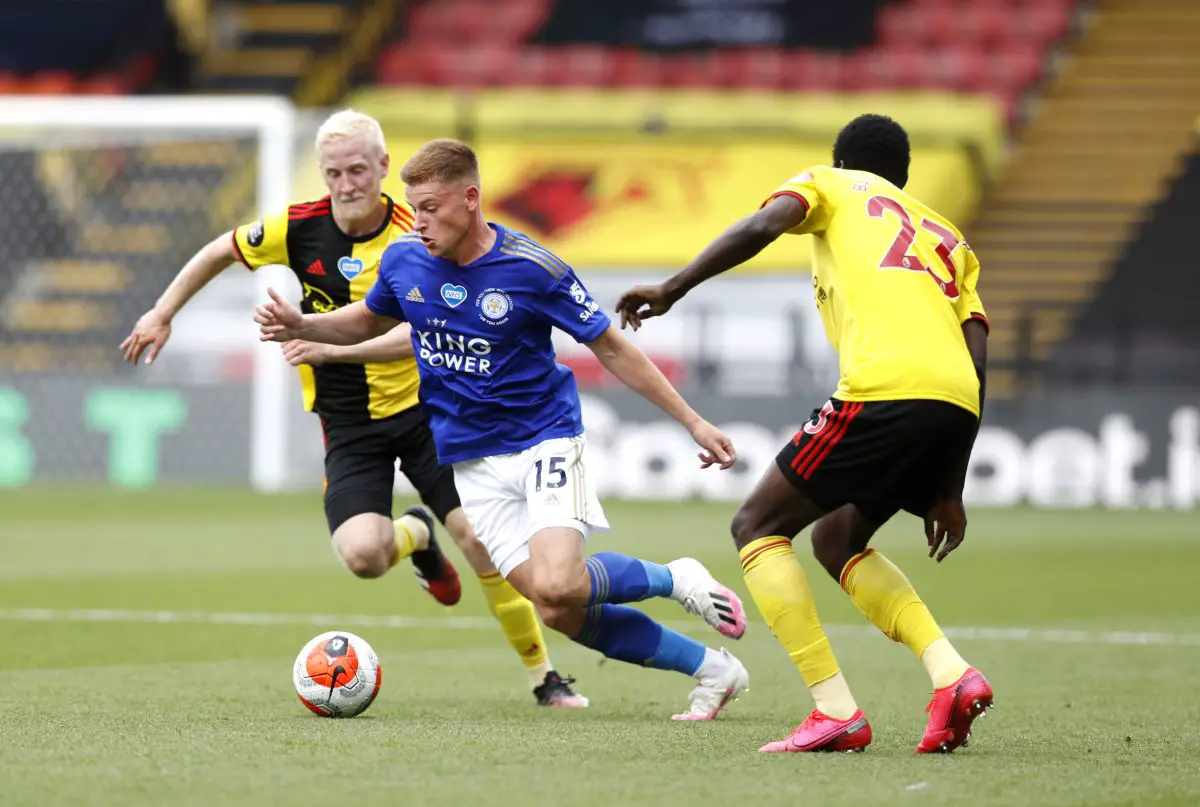 Harvey Barnes of Leicester City is challenged by Will Hughes and Ismaila Sarr of Watford.
