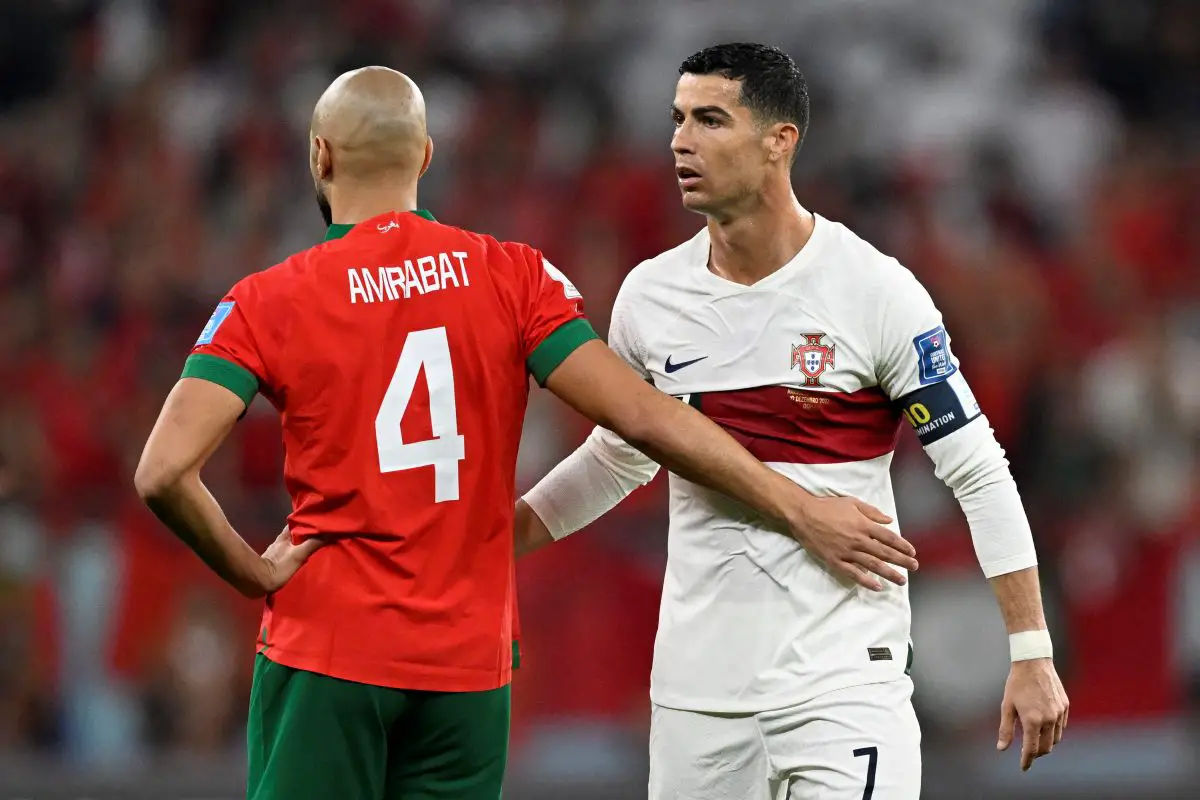 Portugal's Cristiano Ronaldo with Morocco captain, Sofyan Amrabat.