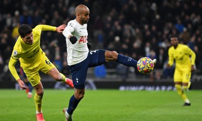 Tottenham Hotspur's Lucas Moura vies for the ball against Brentford's Christian Norgaard. (Photo by DANIEL LEAL/AFP via Getty Images)