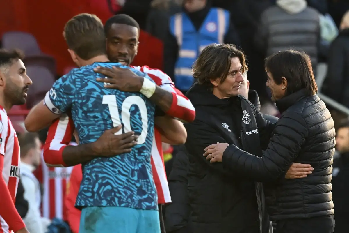 Tottenham Hotspur's Harry Kane and Antonio Conte embrace Ivan Toney and Thomas Frank, respectively.