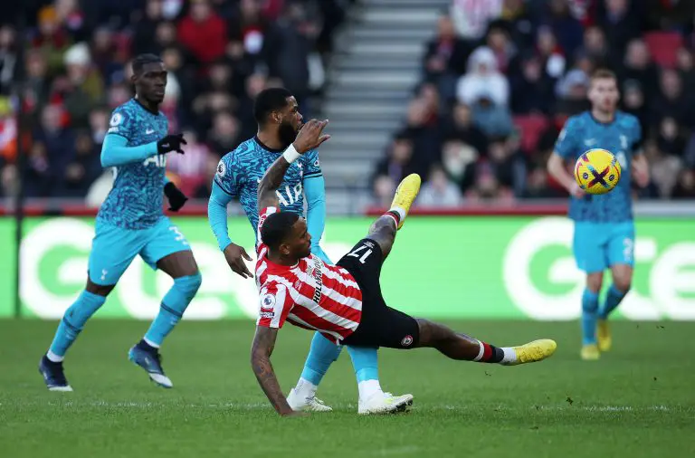 Ivan Toney of Brentford is challenged by Japhet Tanganga of Tottenham Hotspur during the Premier League match between Brentford FC and Tottenham Hotspur at Brentford Community Stadium on December 26, 2022 in Brentford, England. (Photo by Eddie Keogh/Getty Images)