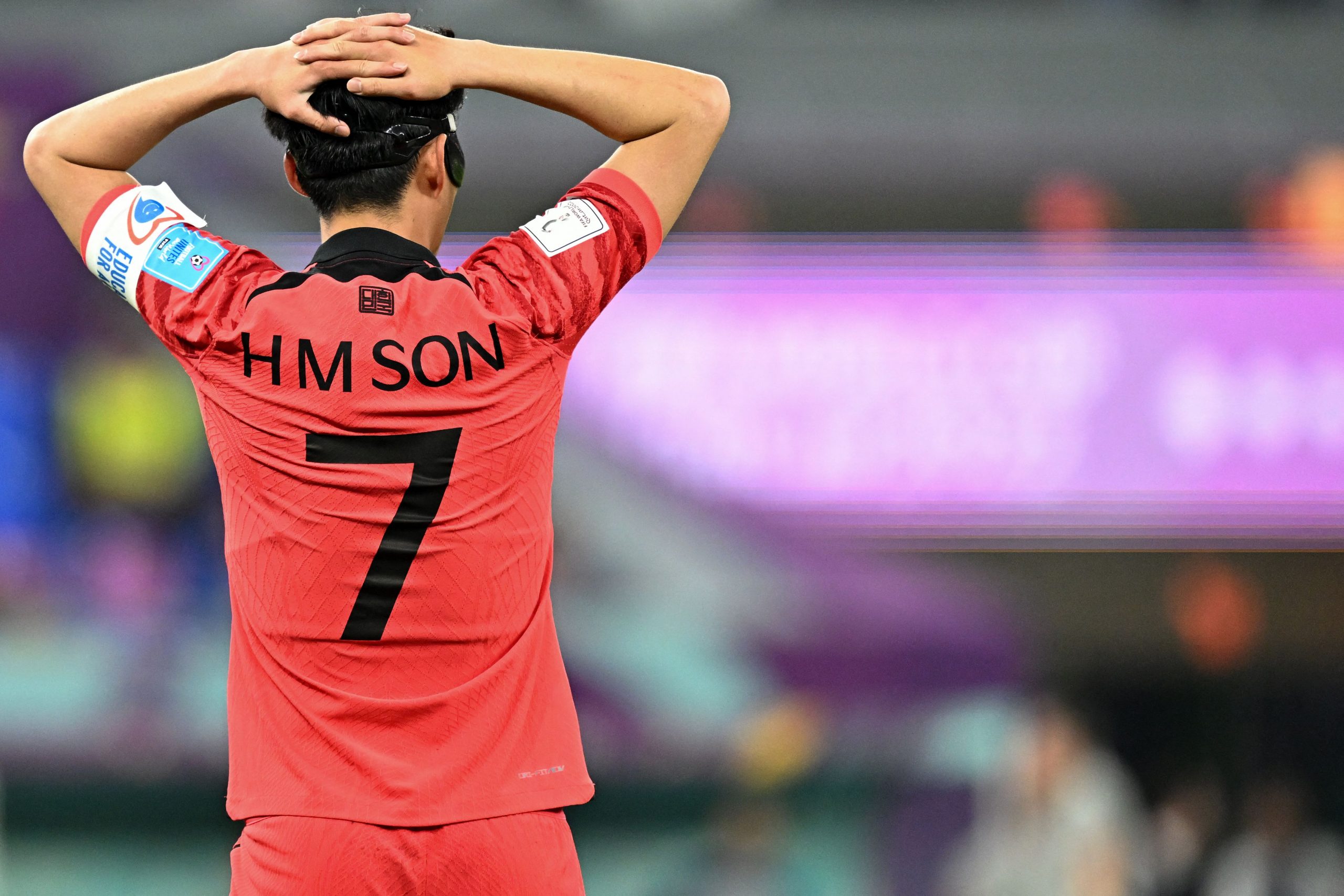 South Korea's midfielder #07 Son Heung-min reacts to a missed chance during the Qatar 2022 World Cup round of 16 football match between Brazil and South Korea at Stadium 974 in Doha on December 5, 2022. (Photo by MANAN VATSYAYANA / AFP) (Photo by MANAN VATSYAYANA/AFP via Getty Images)