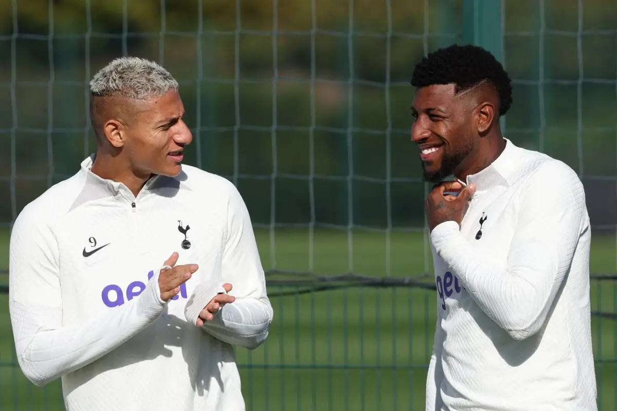 Tottenham Hotspur's Brazilian striker Richarlison (L) and Tottenham Hotspur's Brazilian defender Emerson Royal (R) speak together as they take part in a team training session at Tottenham Hotspur Football Club Training Ground in north London on October 11, 2022 on the eve of their UEFA Champions League Group D football match against Eintracht Frankfurt