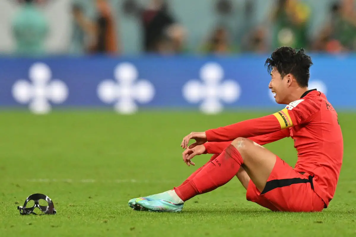 Son Heung-min celebrates his team's victory. (Photo by GLYN KIRK/AFP via Getty Images)