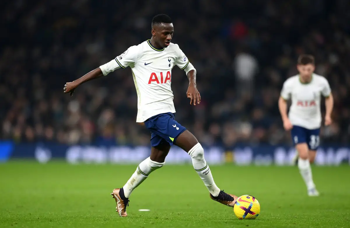 Pape Matar Sarr of Tottenham Hotspur runs with the ball during the Friendly match between Tottenham Hotpsur and OGC Nice at Tottenham Hotspur Stadium on December 21, 2022 in London, England