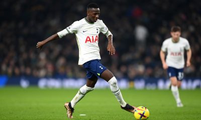 Pape Matar Sarr of Tottenham Hotspur runs with the ball during the Friendly match between Tottenham Hotpsur and OGC Nice at Tottenham Hotspur Stadium on December 21, 2022 in London, England