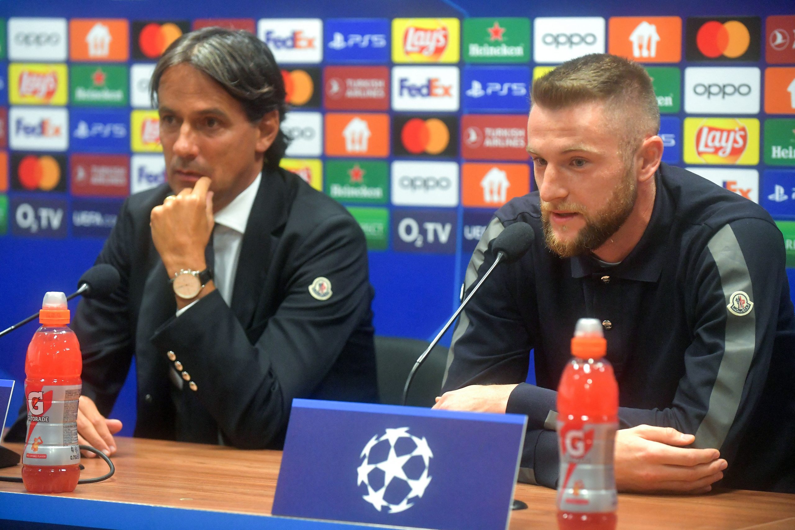Inter Milan's Slovakian defender Milan Skriniar (R) and Inter Milan's Italian head coach Simone Inzaghi address a press conference in Plzen on September 12, 2022, on the eve of the UEFA Champions League Group C second leg football match between FC Viktoria Plzen and Inter Milan. (Photo by Michal Cizek / AFP) (Photo by MICHAL CIZEK/AFP via Getty Images)