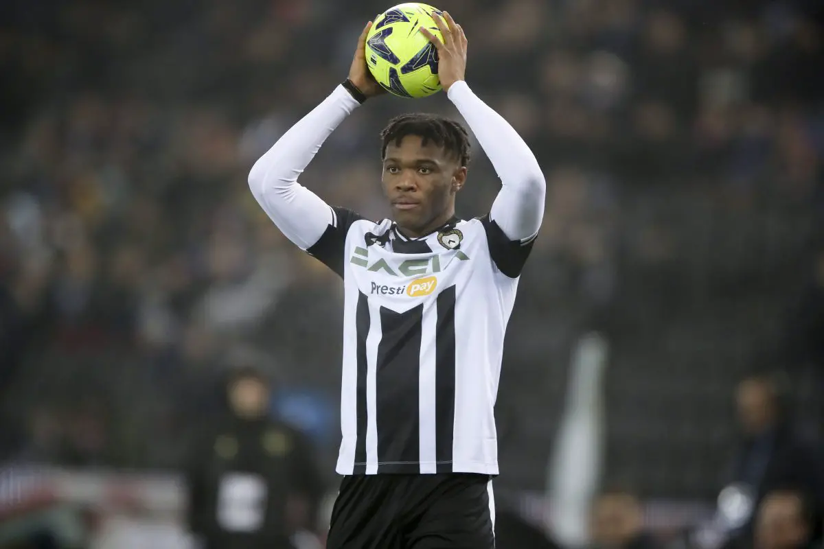 Destiny Udogie of Udinese Calcio makes a throw in during the Serie A match between Udinese Calcio and Empoli FC at the Dacia Arena on January 4, 2023 in Udine, Italy. (Photo by Timothy Rogers/Getty Images)
