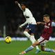 Tottenham Hotspur's English defender Djed Spence (L) vies with Aston Villa's Lucas Digne.