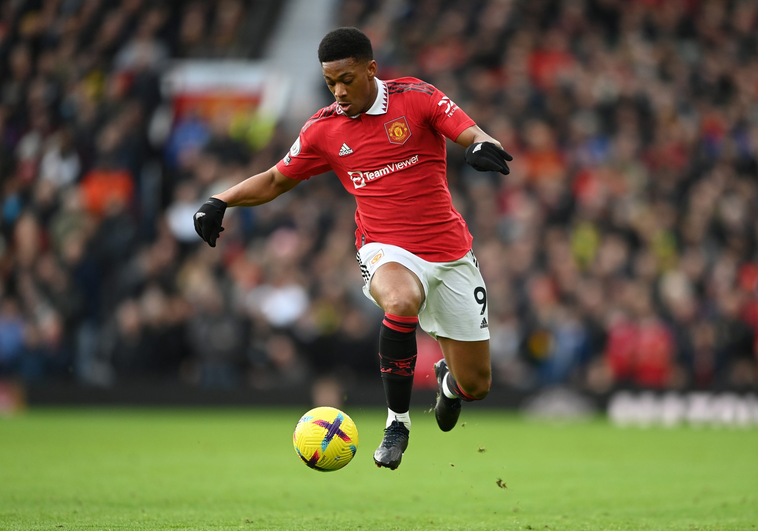 Anthony Martial of Manchester United controls the ball during the Premier League match between Manchester United and Manchester City at Old Trafford on January 14, 2023 in Manchester, England. (Photo by Michael Regan/Getty Images)
