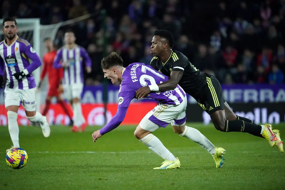 Real Valladolid's Ivan Fresneda vies with Real Madrid's Vinicius Junior. 