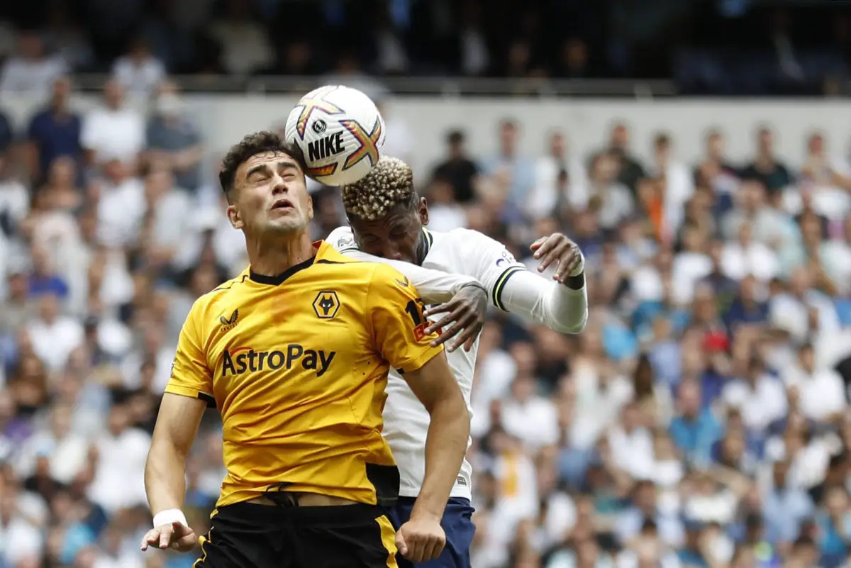 Wolves' Max Kilman vies with Tottenham Hotspur's Emerson Royal.