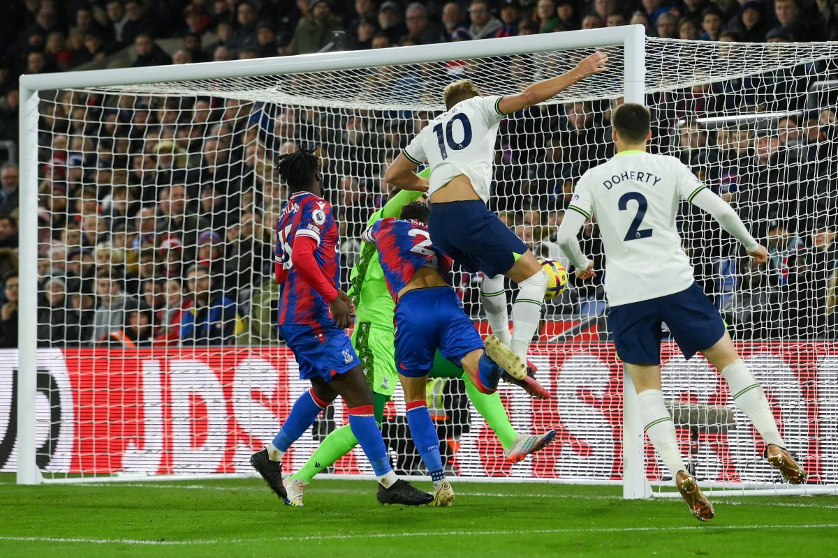 Harry Kane of Tottenham Hotspur scores a header against Crystal Palace. 