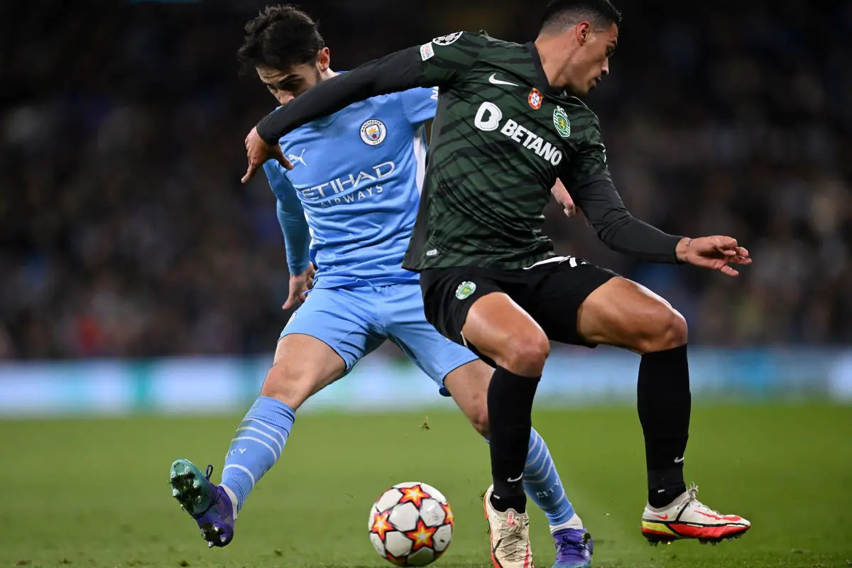 Manchester City's Bernardo Silva vies with Sporting Lisbon's Pedro Porro