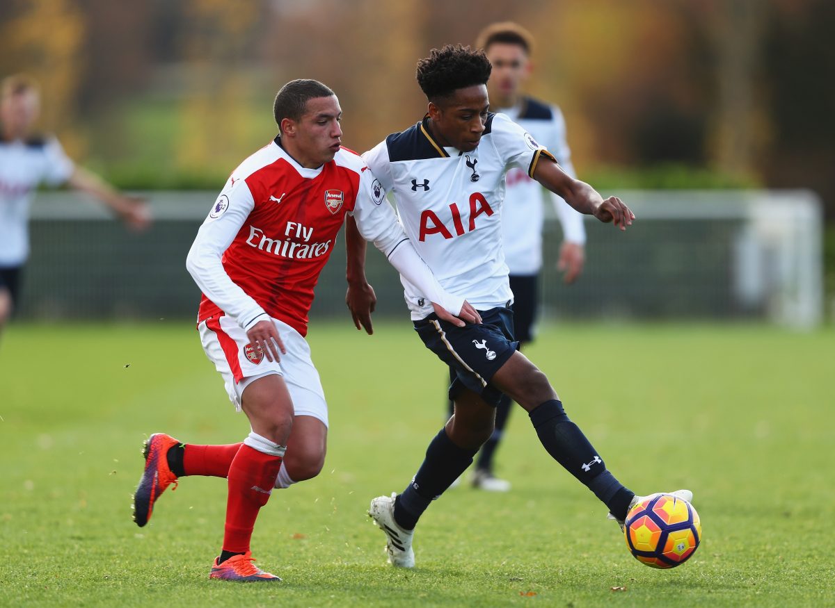 Kyle Walker-Peters of Tottenham Hotspur is challenged by Ismael Bennacer of Arsenal during a Premier League 2 match in November 2016