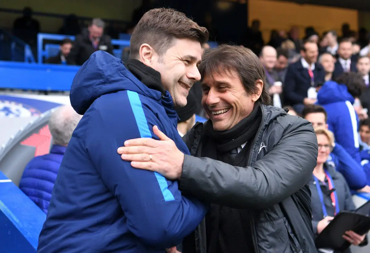 Mauricio Pochettino with Antonio Conte during a game between Chelsea and Tottenham Hotspur.