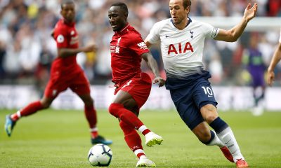 Naby Keita of Liverpool (L) is challenged by Harry Kane of Tottenham Hotspur during the Premier League match between Tottenham Hotspur and Liverpool FC at Wembley Stadium on September 15, 2018 in London, United Kingdom. (Photo by Julian Finney/Getty Images)