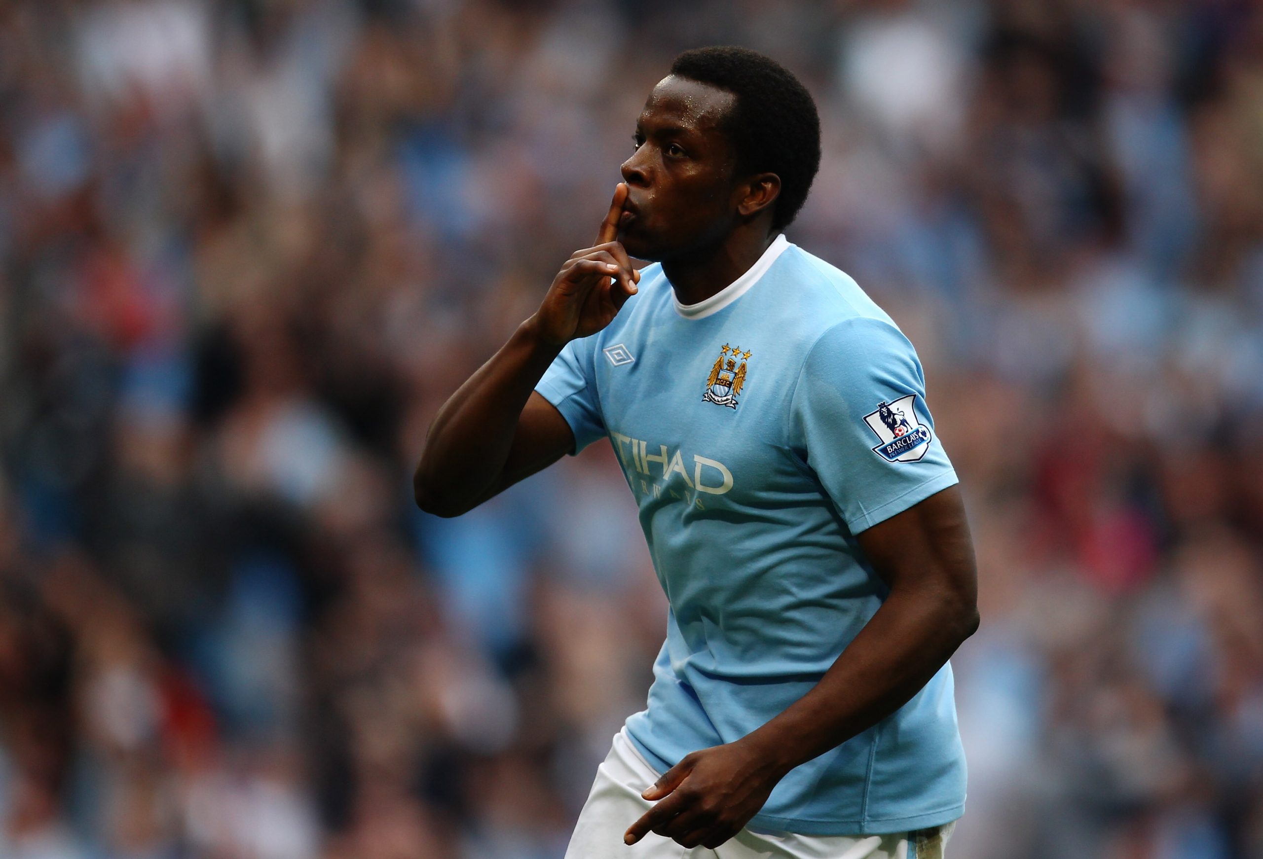 Nedum Onuoha of Manchester City celebrates scoring a goal against Birmingham City.