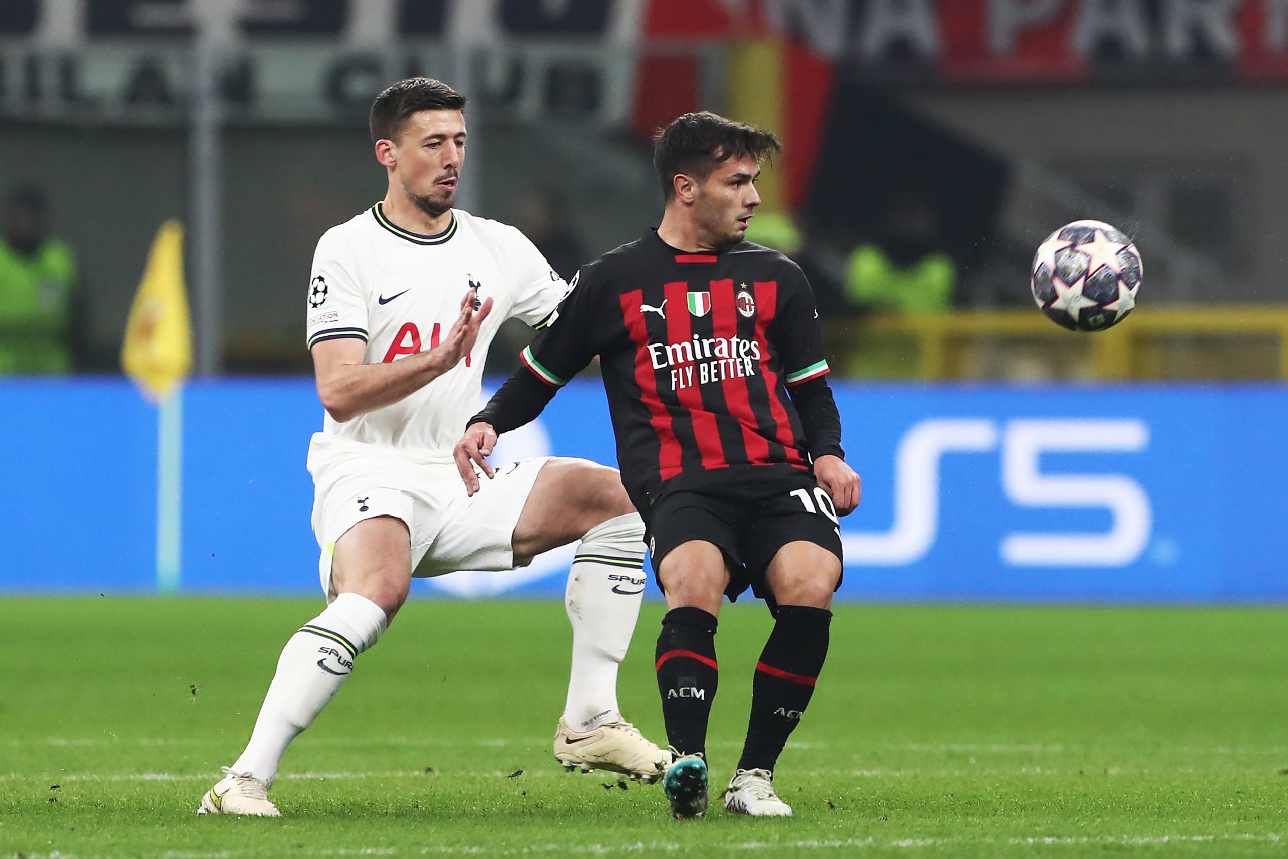 Brahim Diaz of AC Milan is challenged by Clement Lenglet of Tottenham Hotspur.