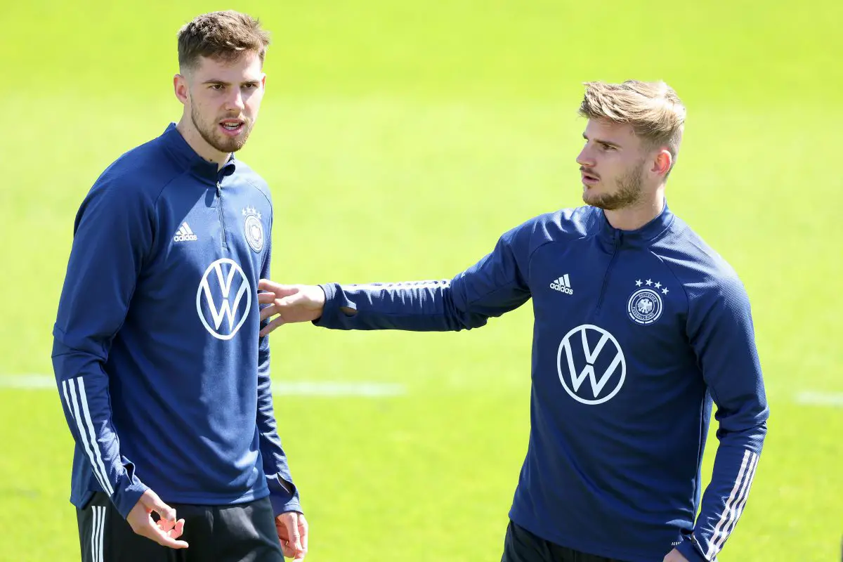 Anton Stach talks to his Timo Werner during a training session of the German national team. 